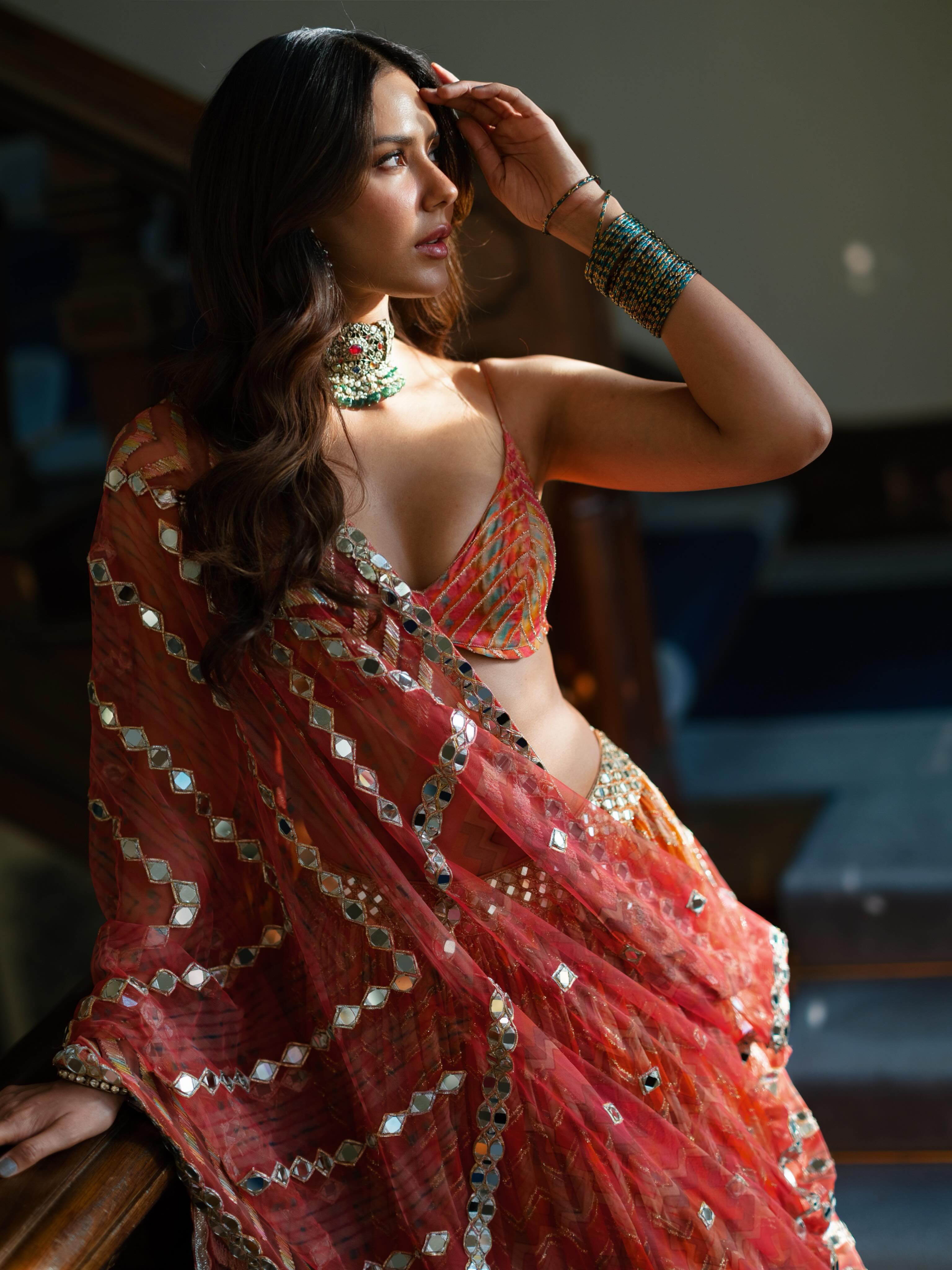 Sonam Bajwa Stuns in Red Mirror Lehenga