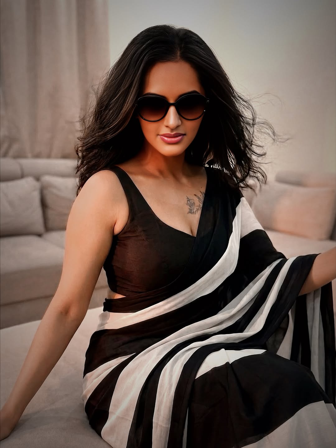 Jyoti Poorvaj Stuns in a Chic Striped Saree With Bold Style