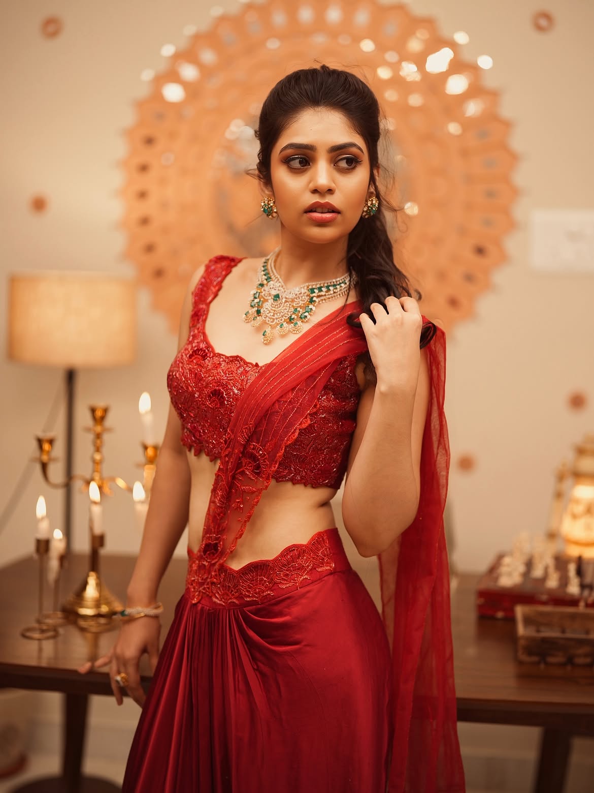 Bandhavi Sridhar Dazzles in Stunning Red Saree Glam Photoshoot