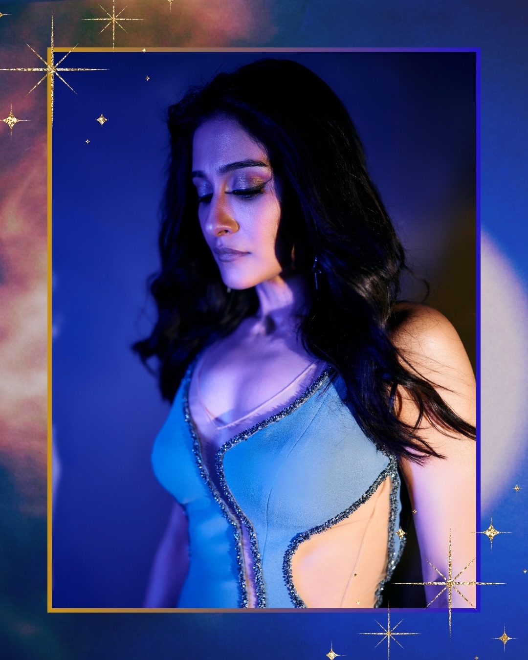 Regena Cassandrra Turns Heads with Elegant Blue Gown
