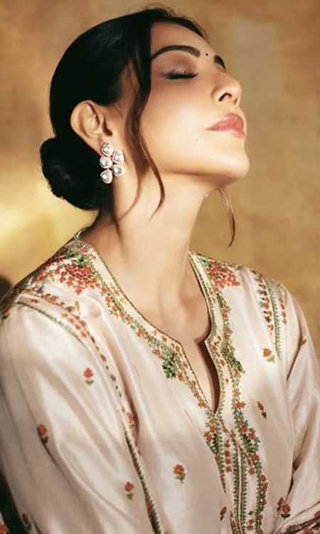 Kajal Aggarwal Captivates in Embroidered Ivory