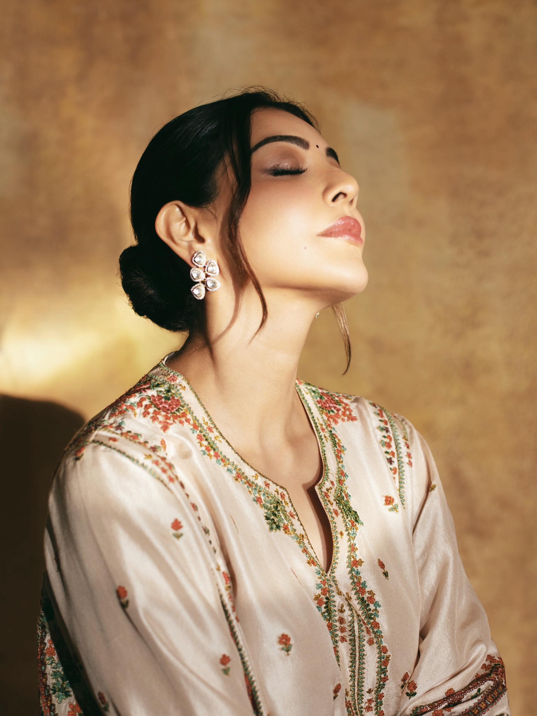 Kajal Aggarwal Captivates in Embroidered Ivory