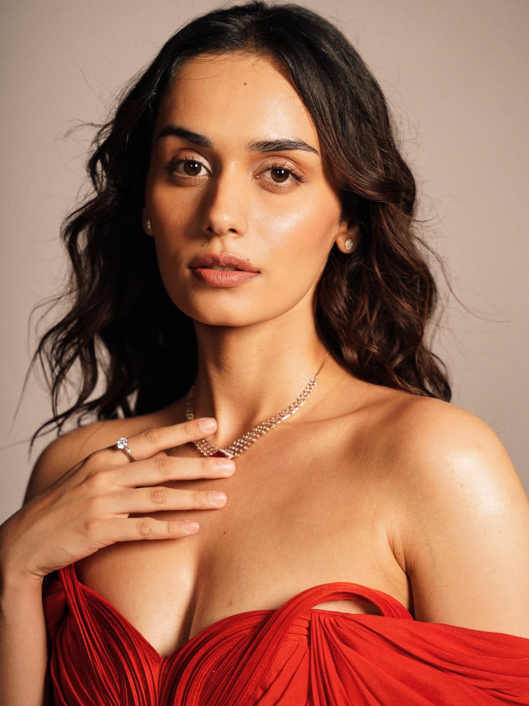 Manushi Chhillar Stuns in Red Gown, Showcases Royal Elegance