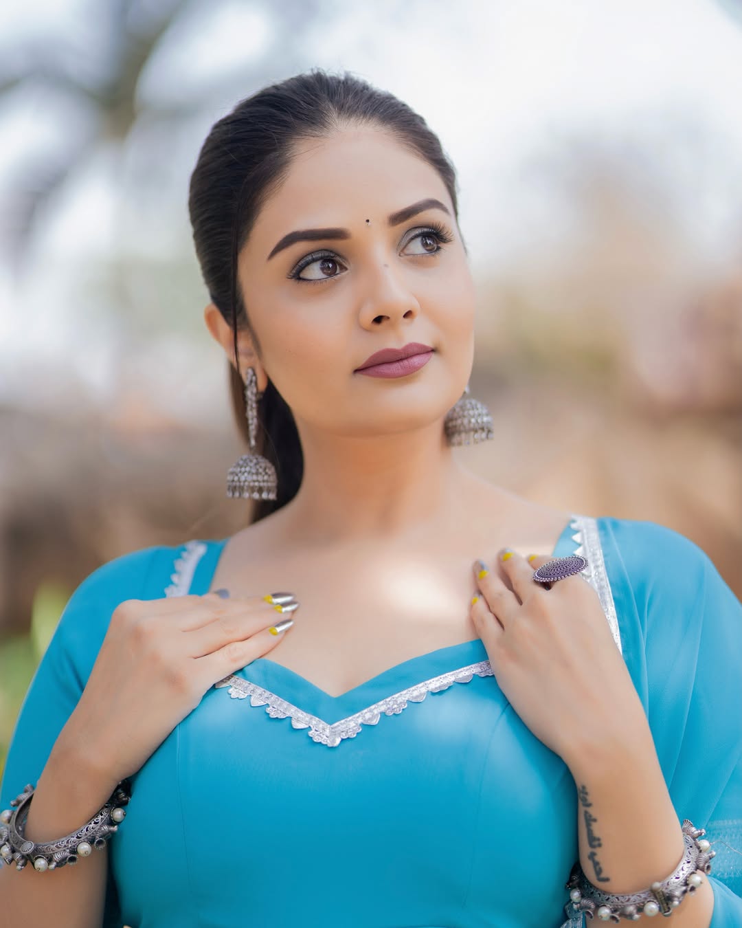Sreemukhi’s Elegant Blue Charm: Graceful Look & Versatile Career