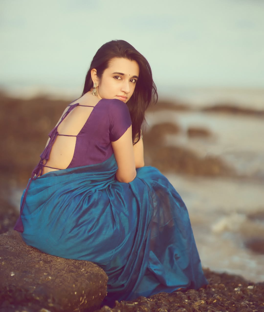 Nuveksha Stuns In Vibrant Saree During Beachside Shoot