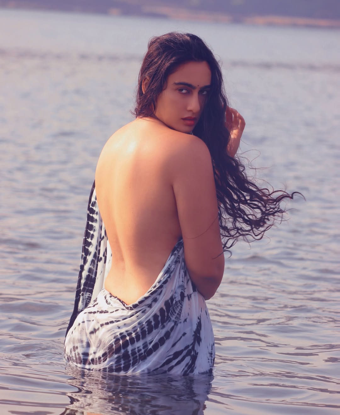 Megha Shukla Radiates Confidence in Mesmerizing Riverfront Portraits