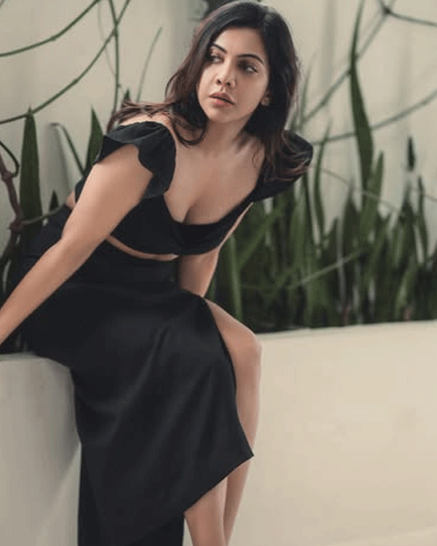 Madonna Sebastian: Elegant Grace in Black