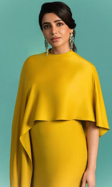 Samantha Shines in Chic Mustard Cape Elegance