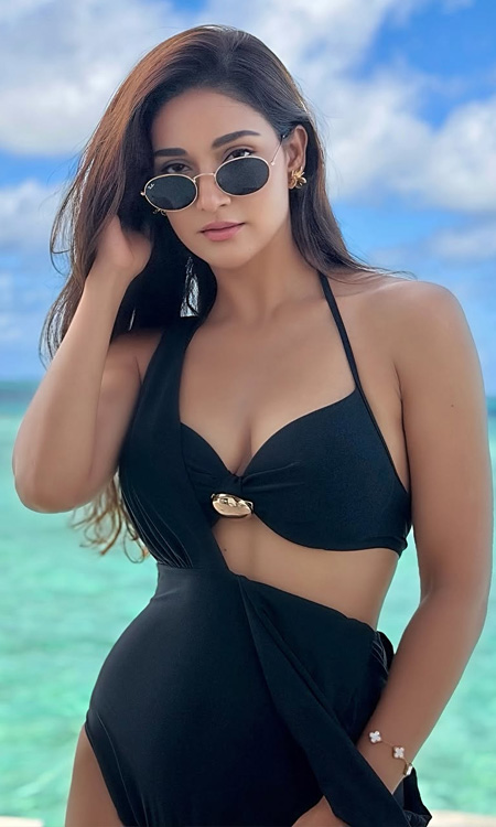 Mukti Mohan Sizzles in Black Swimsuit
