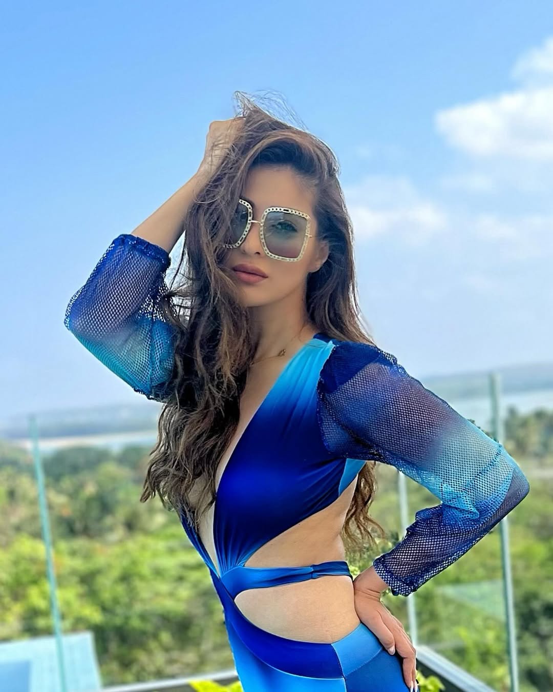 Raai Laxmi Stuns in Blue Satin Glamorous Look with Bold Fashion Style