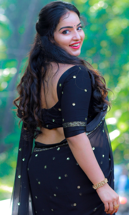 Malavika Menon Radiates Grace in a Glamorous Black Saree