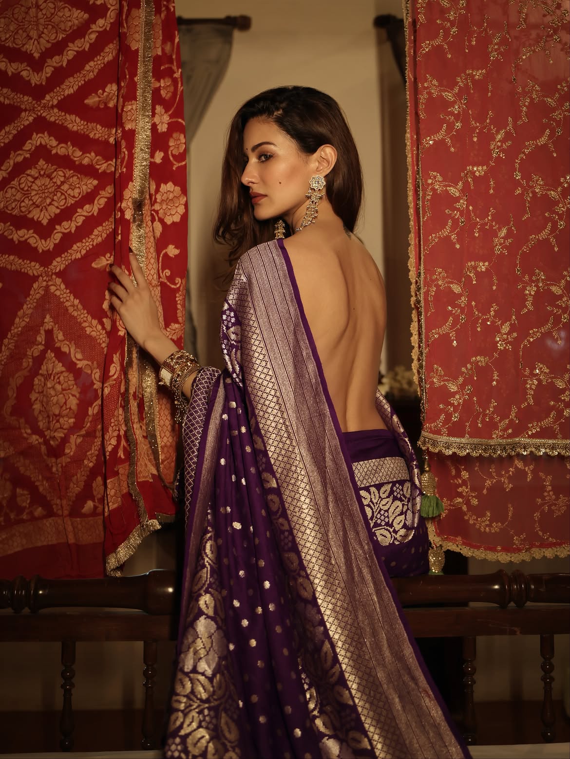 Amyra Dastur Stuns in a Regal Purple Banarasi Silk Saree