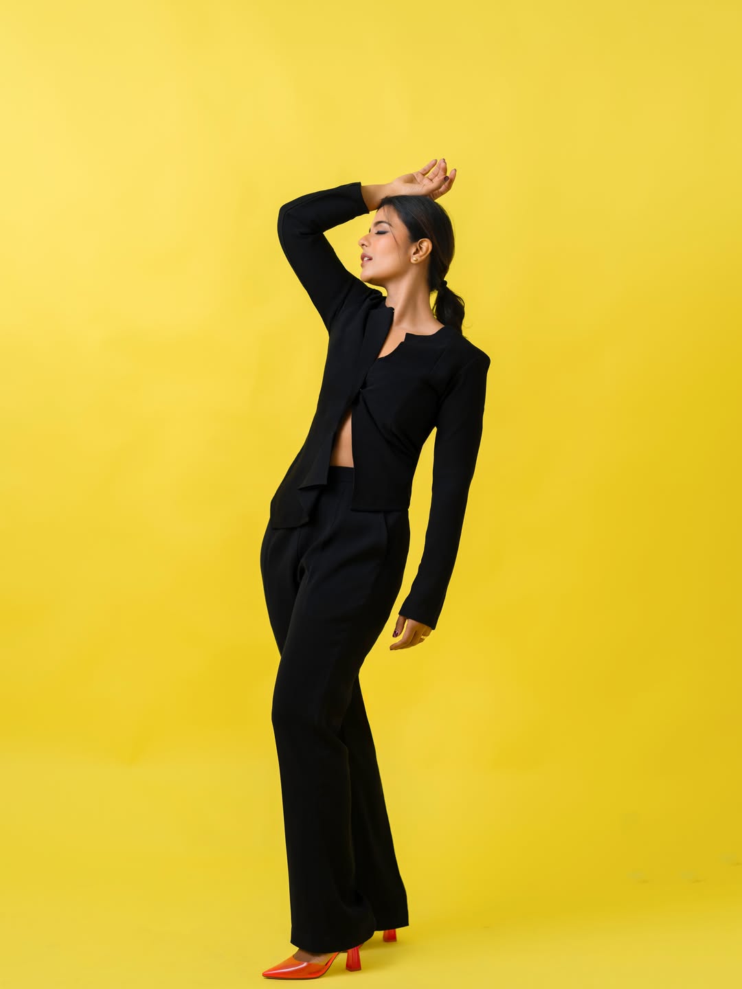 Aishwarya Rajesh Stuns in Chic Black Power Suit and Red Heels