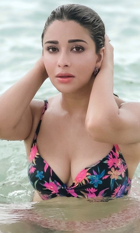 Nyrraa M Banerji Makes a Splash in a Glamorous Poolside Photoshoot