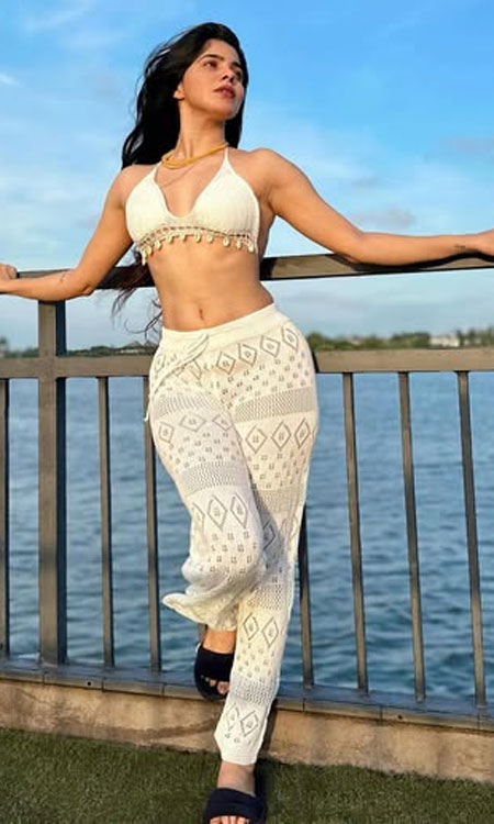 Divya Bharathi’s Stunning Waterfront Photo and Her Film Journey