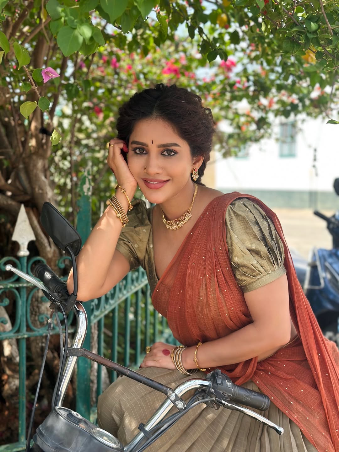 Nabha Natesh Stuns in Rust Orange Saree, Looks Ethereal as a Bougainvillea