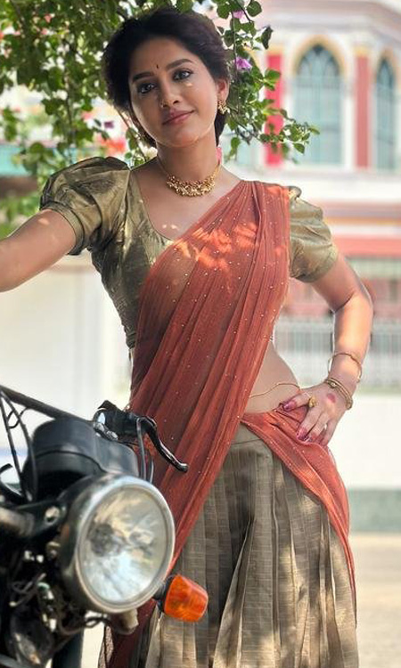 Nabha Natesh Stuns in Rust Orange Saree, Looks Ethereal as a Bougainvillea