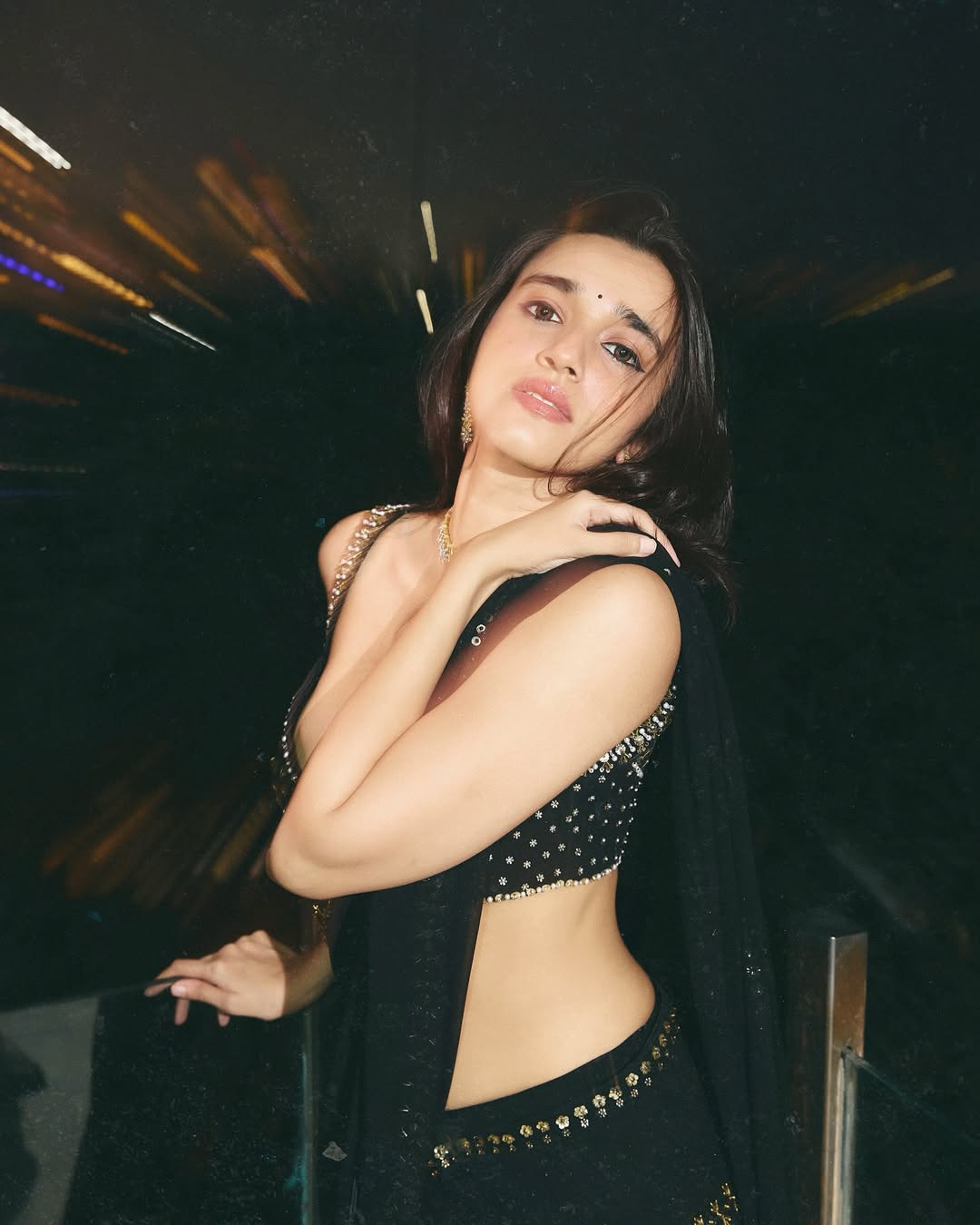 Nuveksha Radiates Elegance in a Sparkling Black Saree