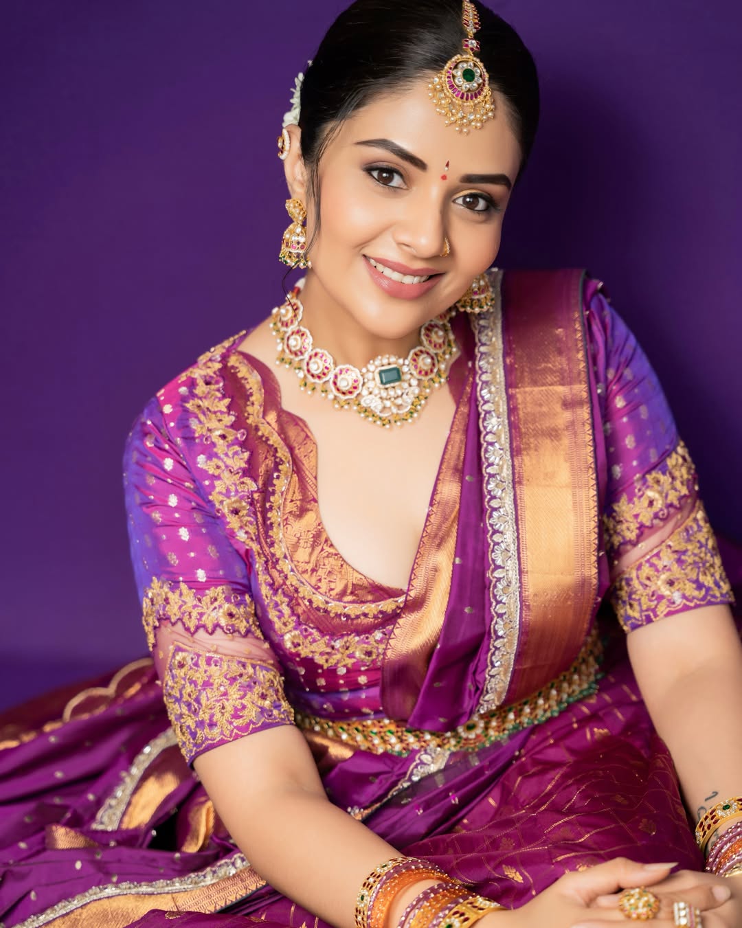 Sreemukhi Stuns in a Regal Purple and Gold Traditional Look