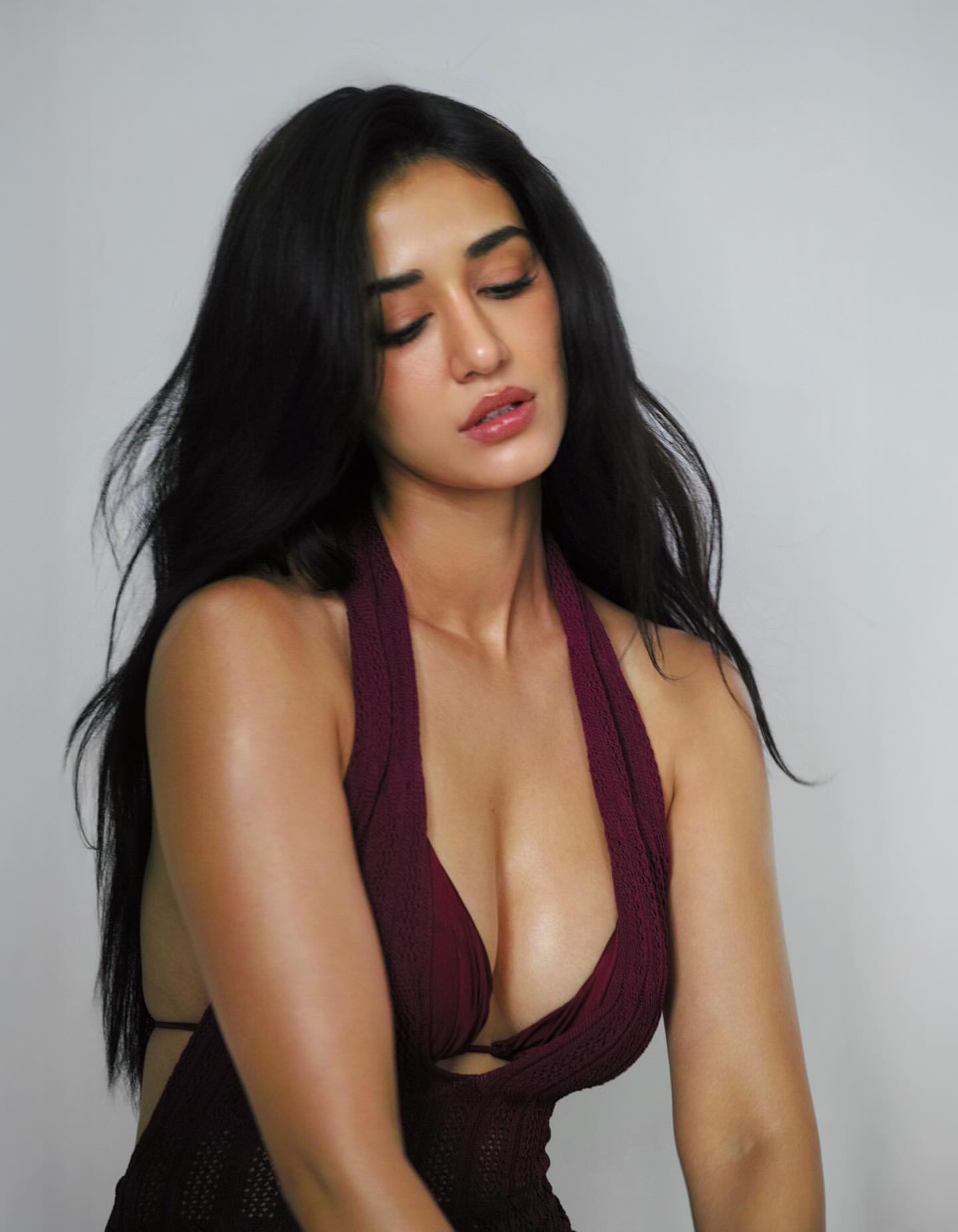 Disha Patani Captivates in Deep Wine Halter Outfit