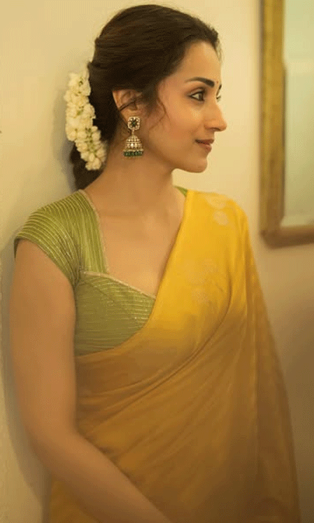 Yellow Elegance: Trisha’s Traditional Glow