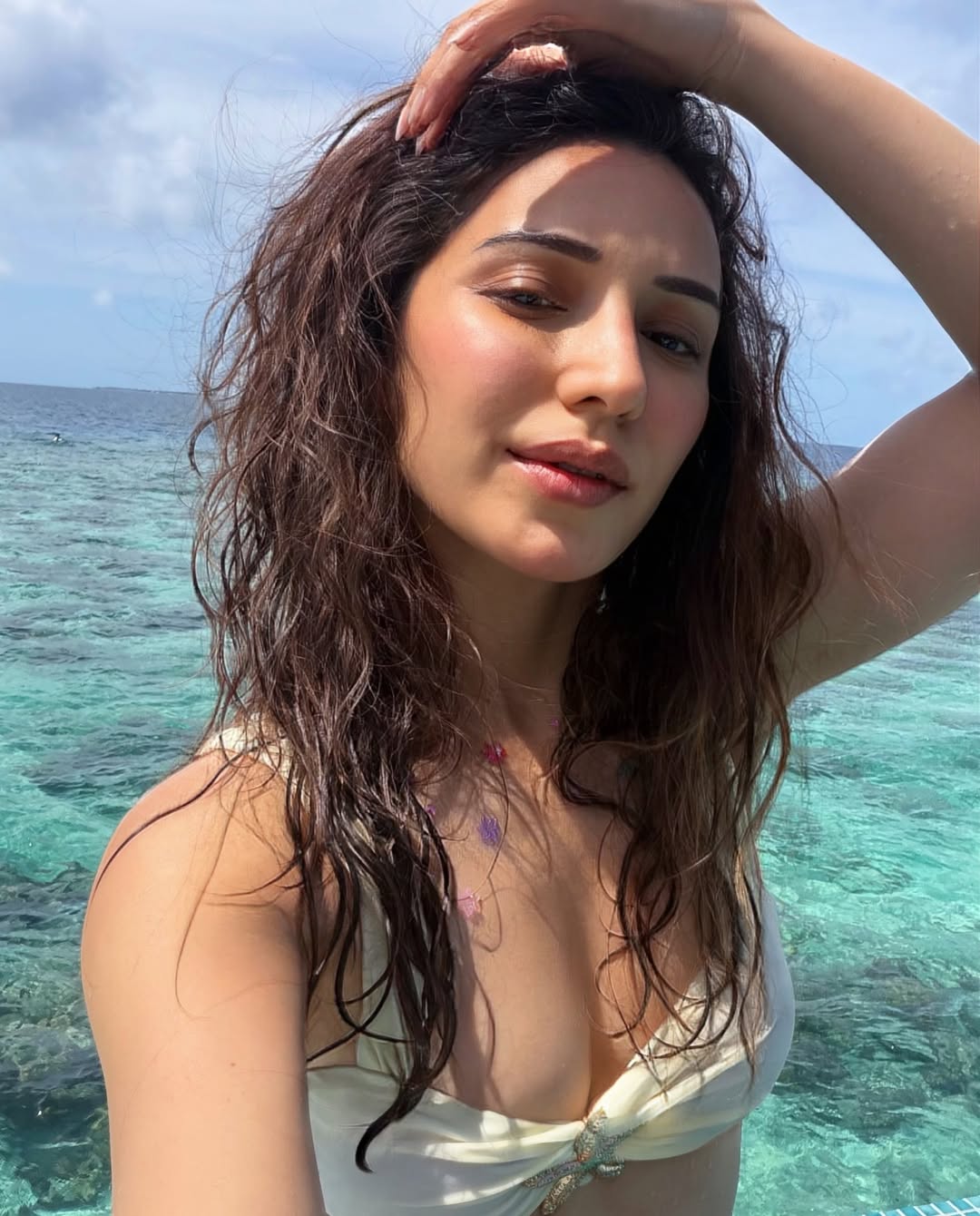 Heli Daruwala’s Tropical Beach Photos Radiate Effortless Summer Vibes