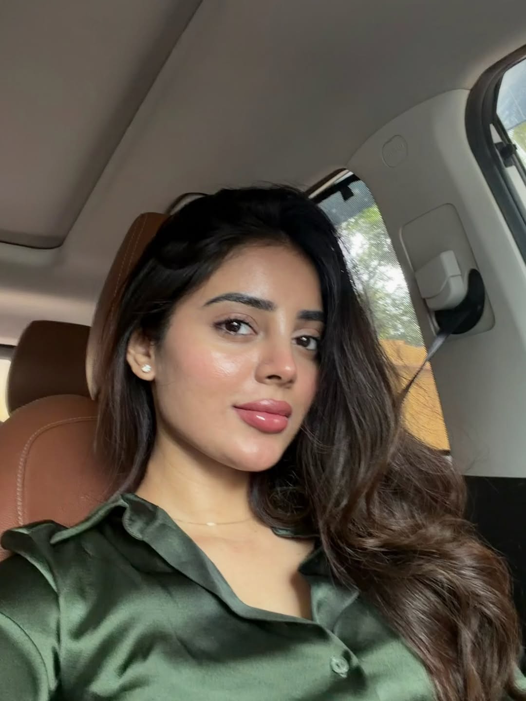 Kushitha Kallapu Stuns in a Chic Green Shirt Car Selfie