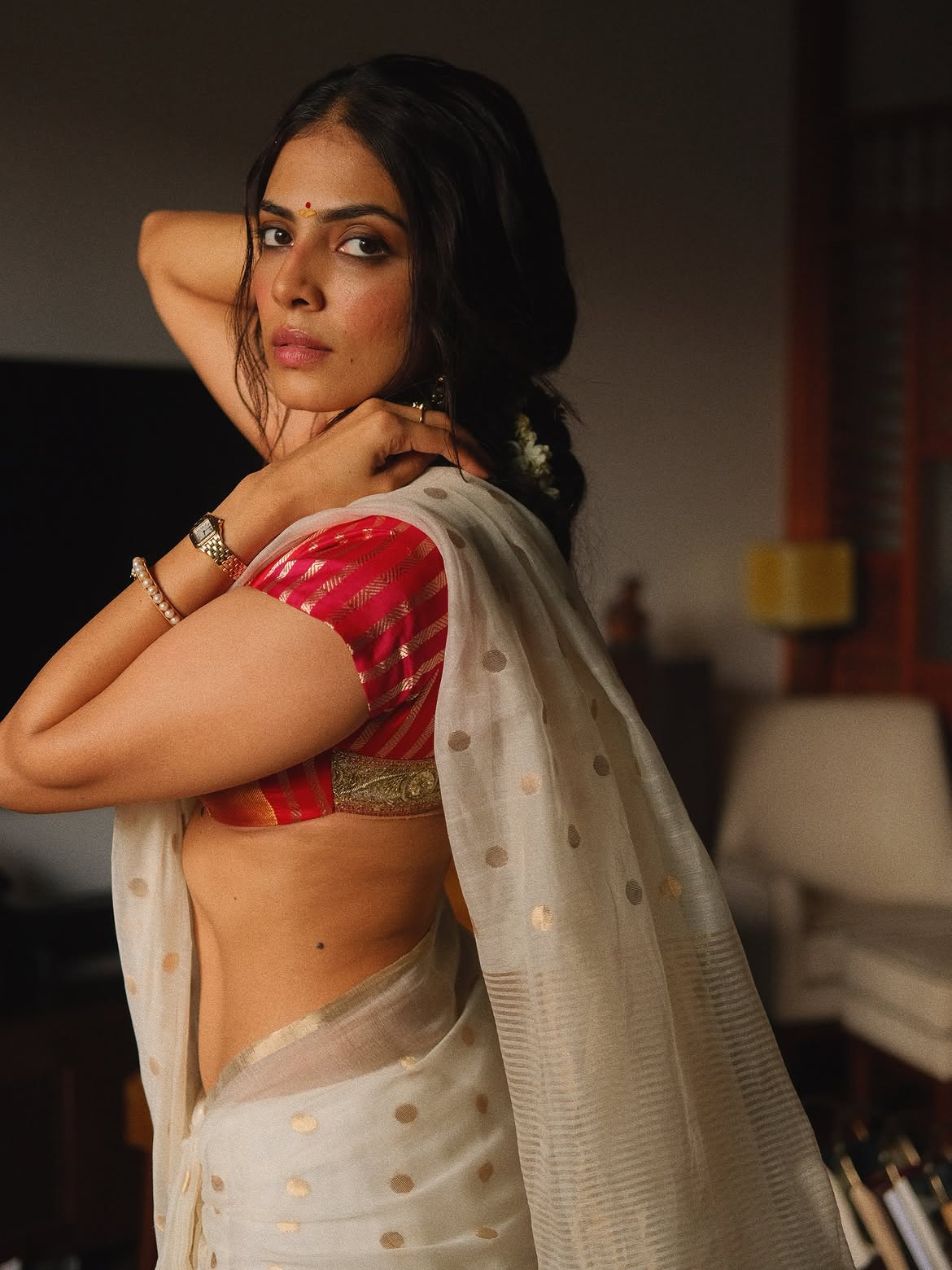 Malavika Mohanan Mesmerizes in White Saree and Vibrant Blouse