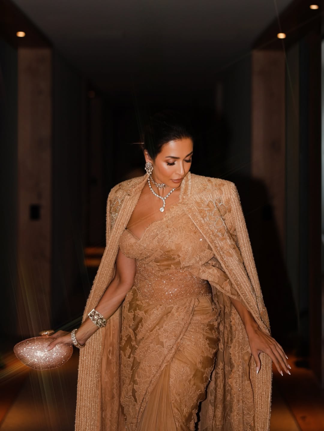Malaika Arora Stuns in a Glamorous Champagne-Gold Saree