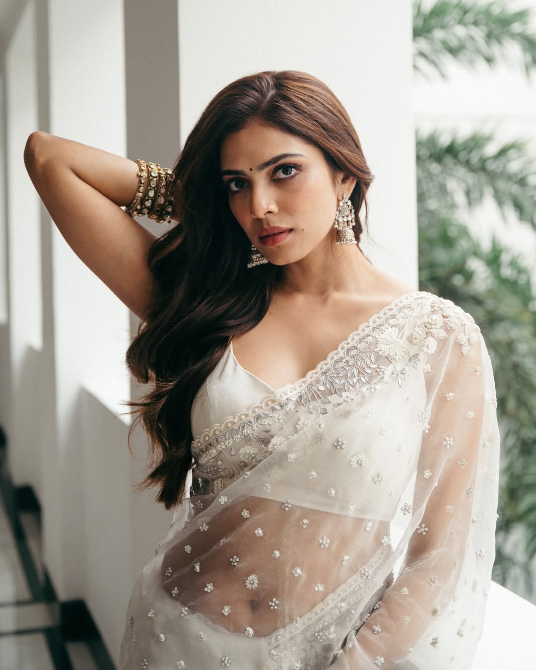 Malavika Mohanan Stuns in Ethereal White Saree, Radiates Timeless Elegance