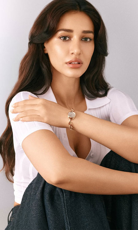 Disha Patani Stuns in Crisp White Look With Calvin Kleins Luxe Gold Watch