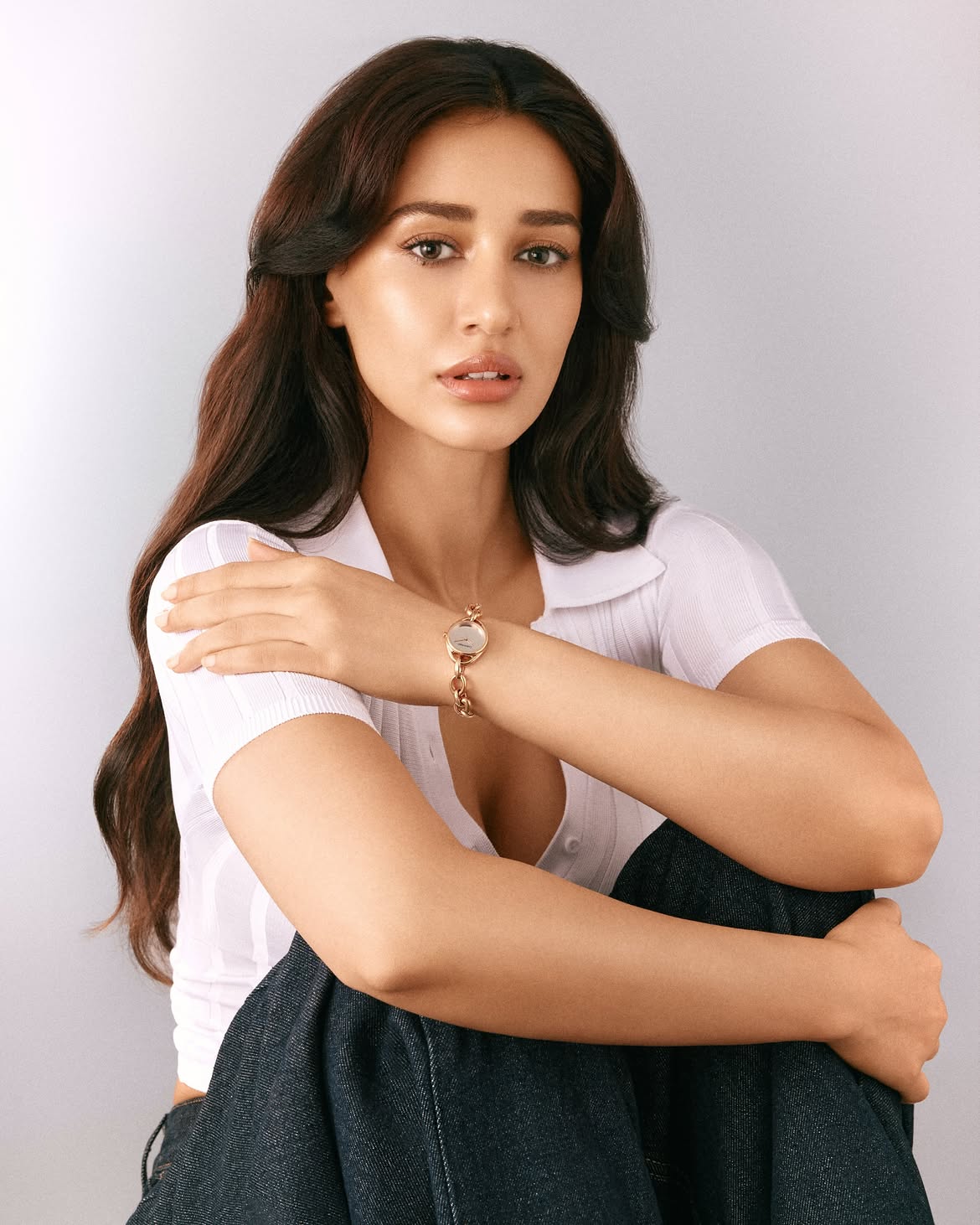 Disha Patani Stuns in Crisp White Look With Calvin Kleins Luxe Gold Watch