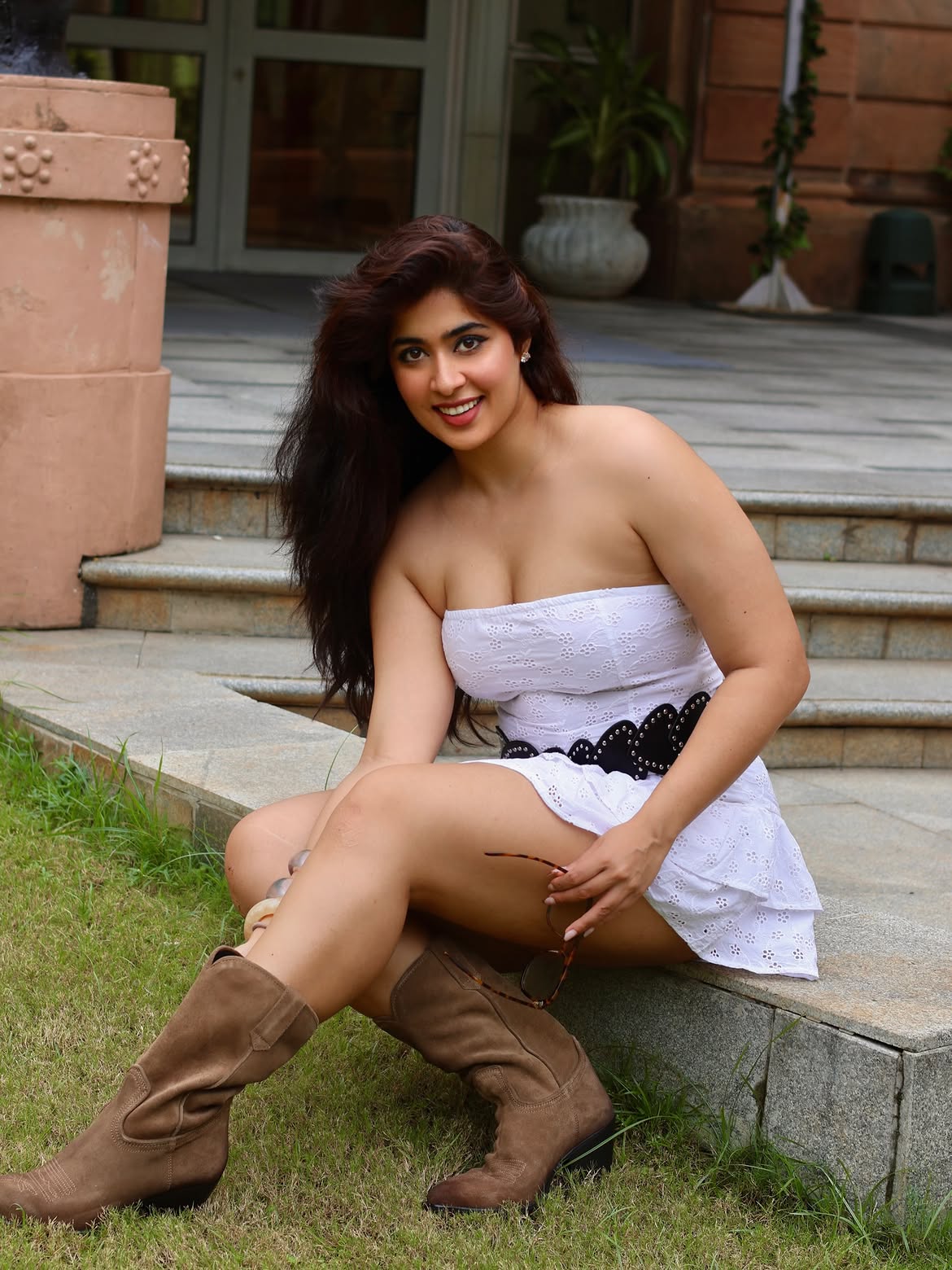 Nikita Sharma Stuns in White Mini Dress and Cowboy Boots Look