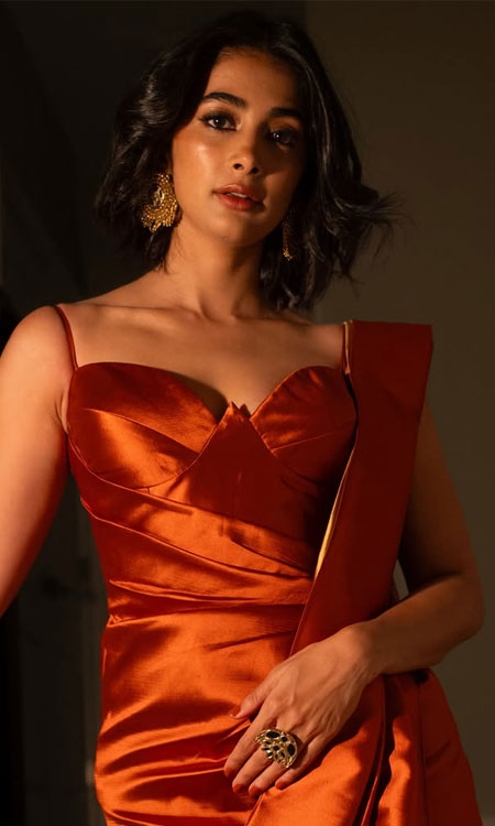 Pooja Hegde Stuns In A Tangerine Satin Gown With Elegant Glamour