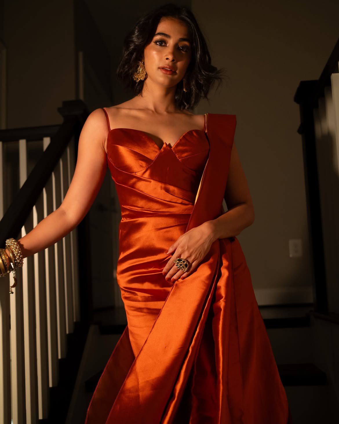 Pooja Hegde Stuns In A Tangerine Satin Gown With Elegant Glamour