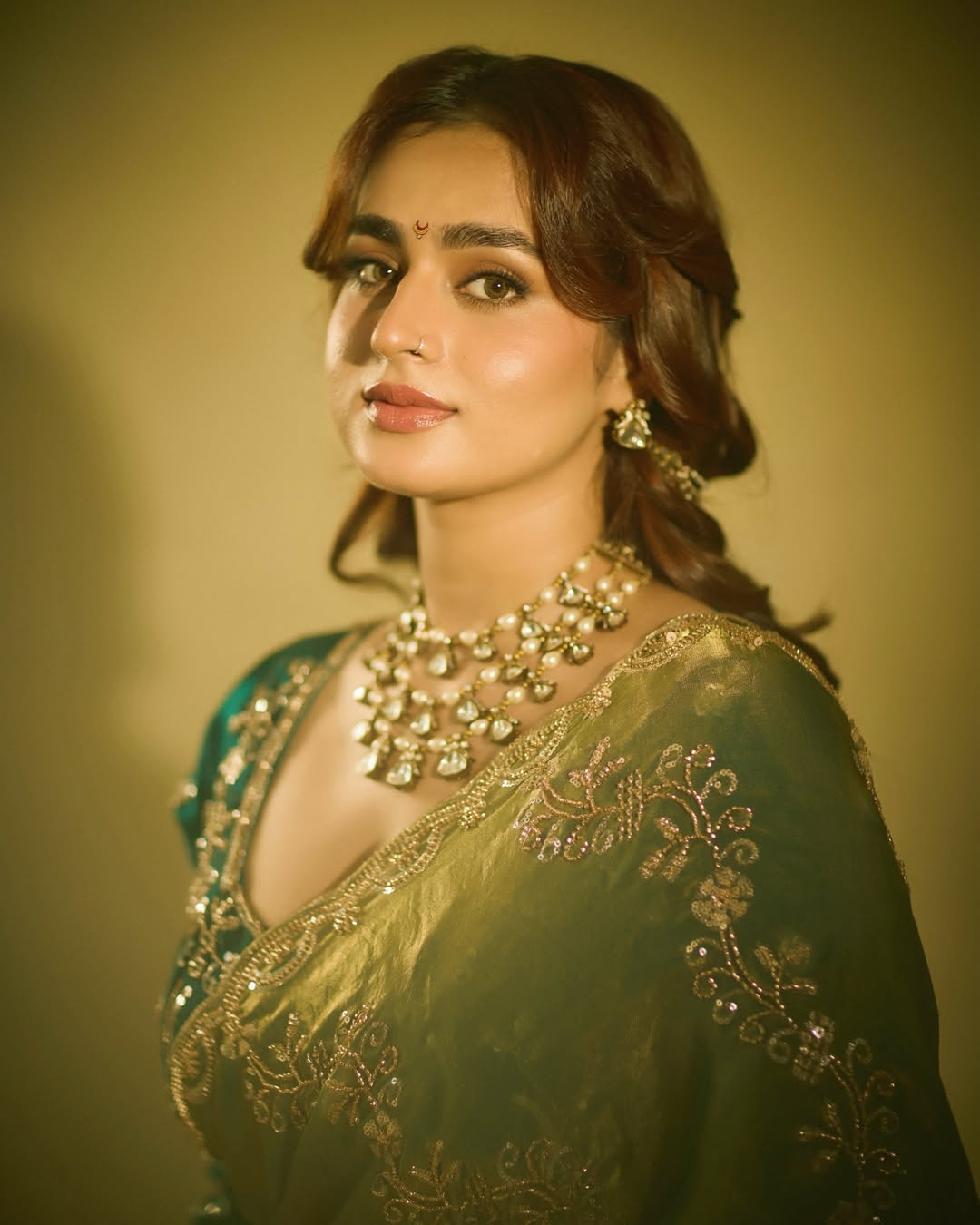 Ayesha Khan Stuns in Elegant Sage Green Saree Look