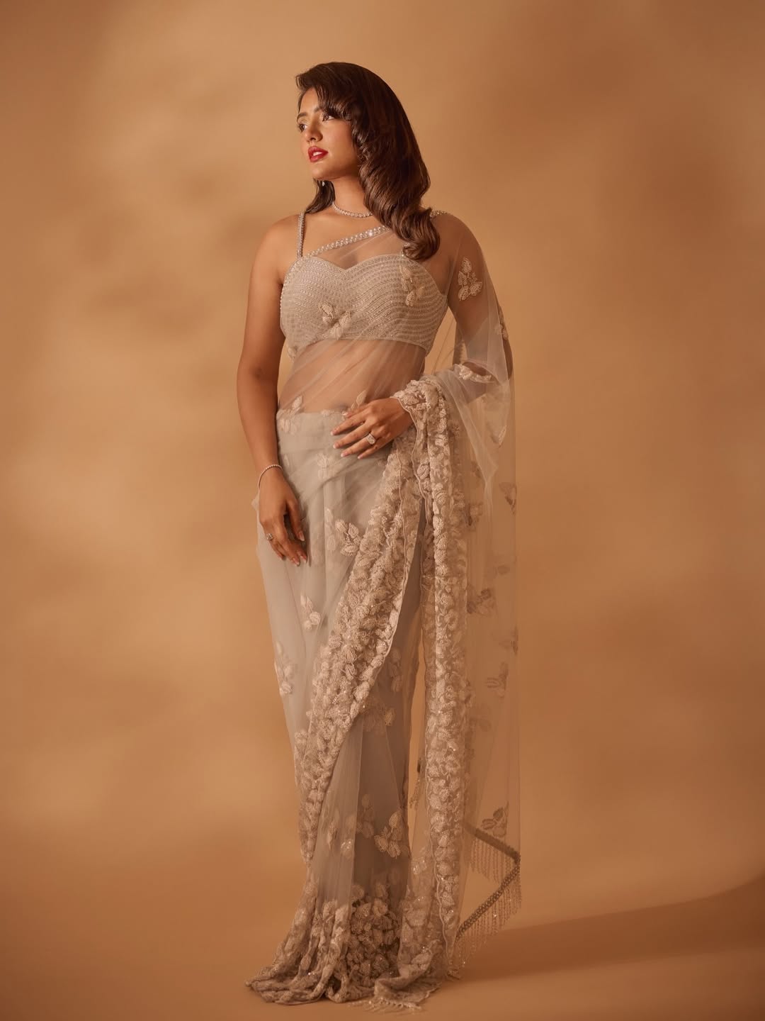 Eesha Rebba Stuns in Sheer Beige Saree With Vintage Glamour