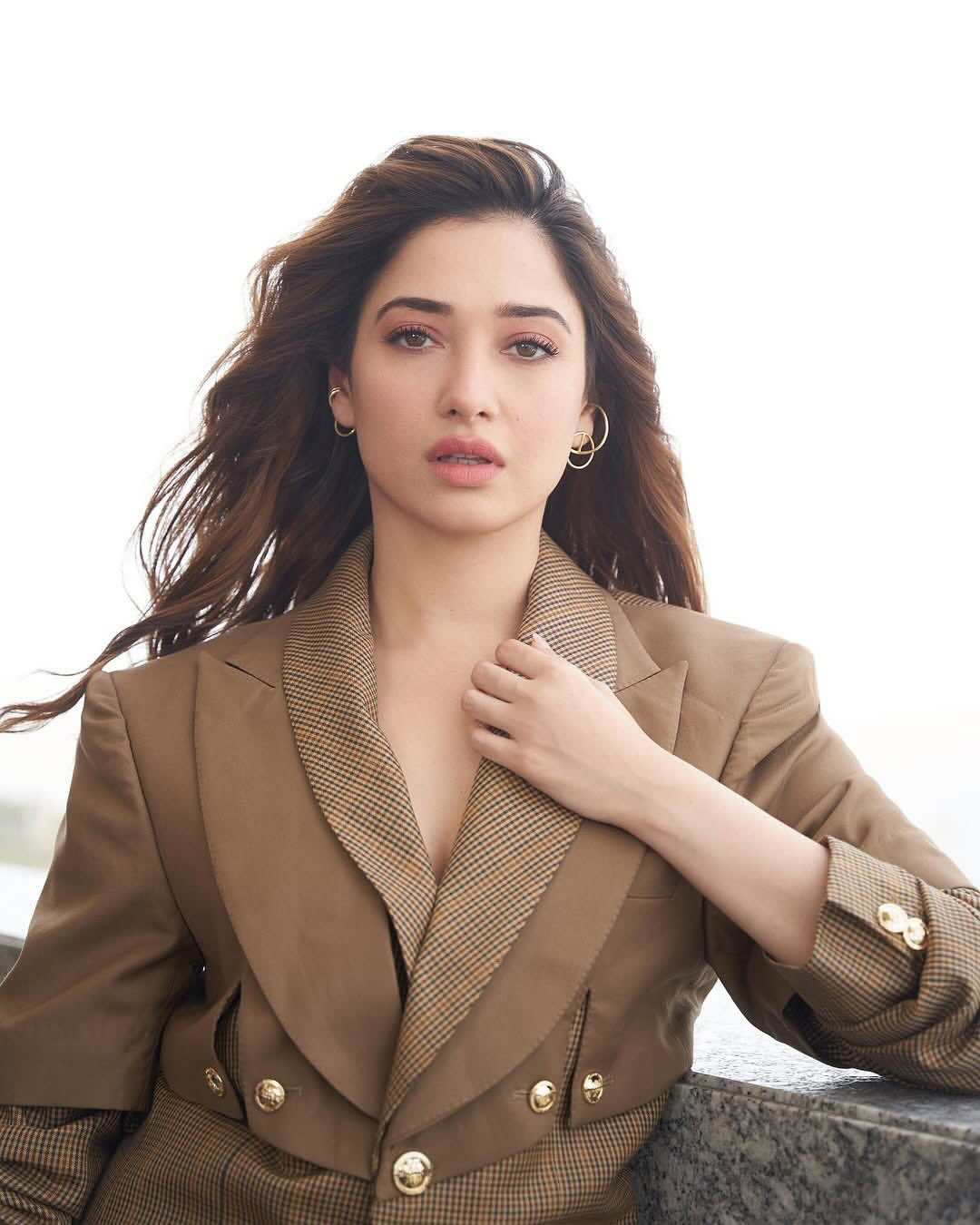 Tamannaah Bhatia Looks Stunning in a Chic Brown Blazer Balcony Portrait