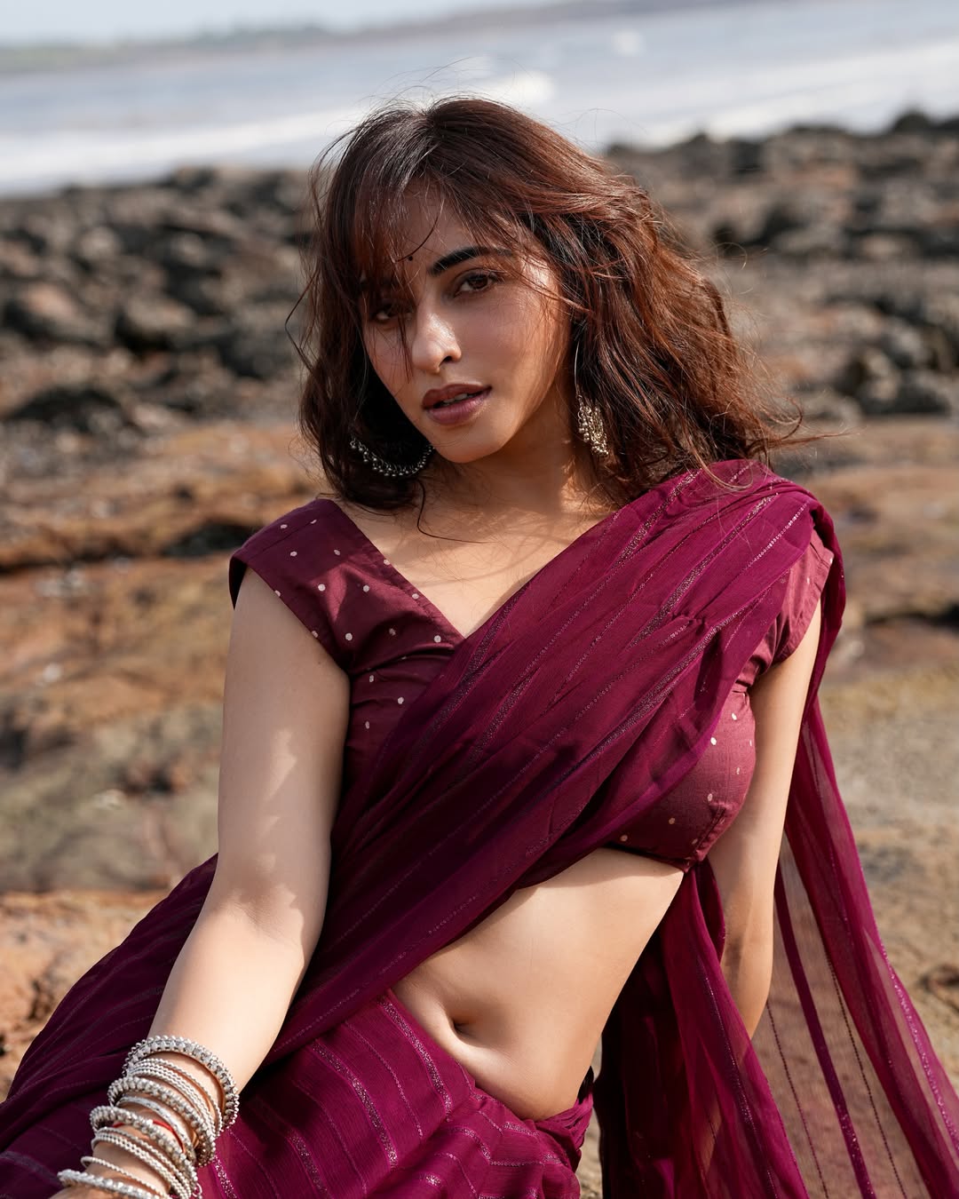 Niyati Fatnani Stuns in Elegant Maroon Saree Look