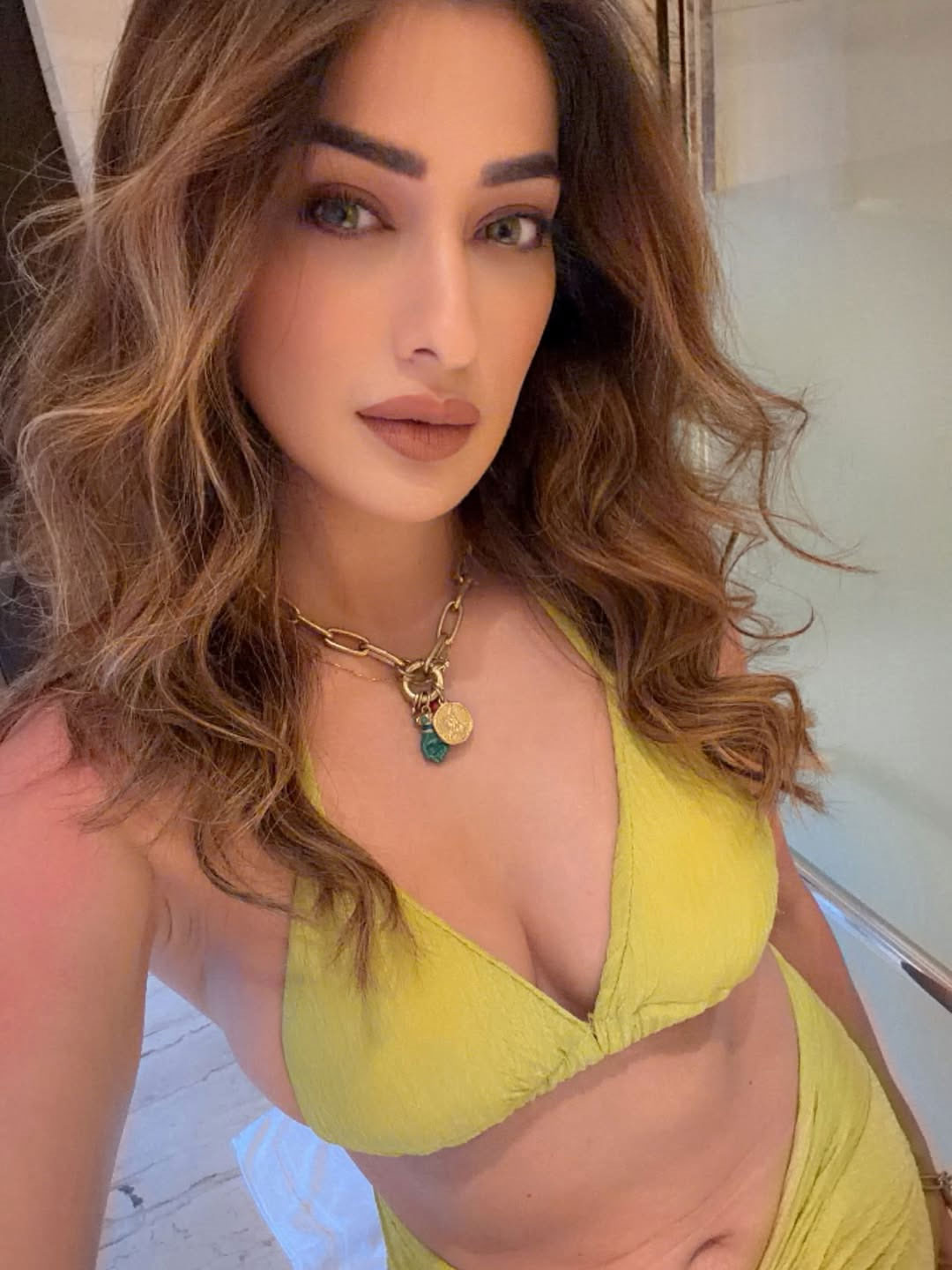 Raai Laxmi Turns Heads in a Stunning Yellow Bikini Look