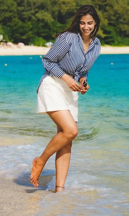 Meenaakshi Chaudhary Stuns in a Breezy Beachside Vacation Look
