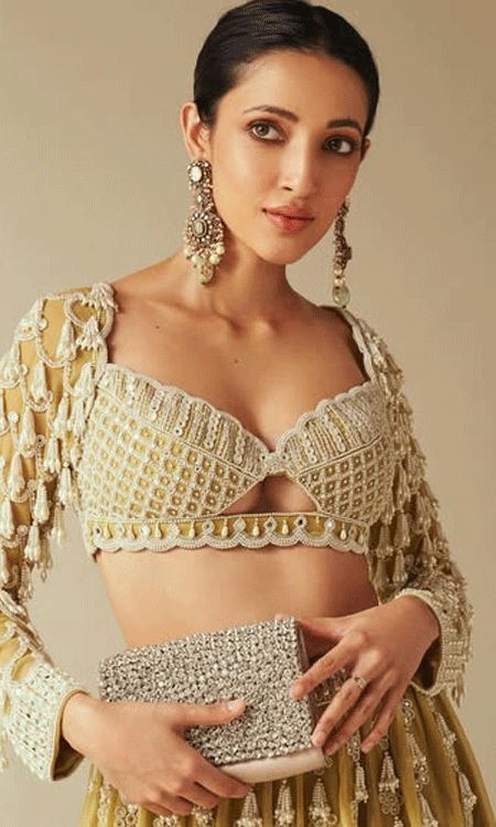 Neha Shetty Stuns in a Regal Mustard Traditional Look