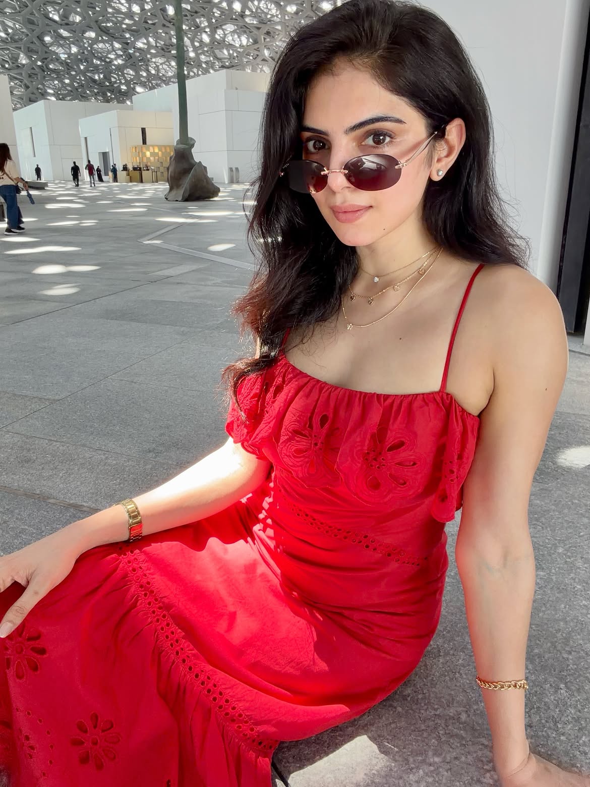 Misha Narang Stuns in a Vibrant Red Eyelet Midi Dress