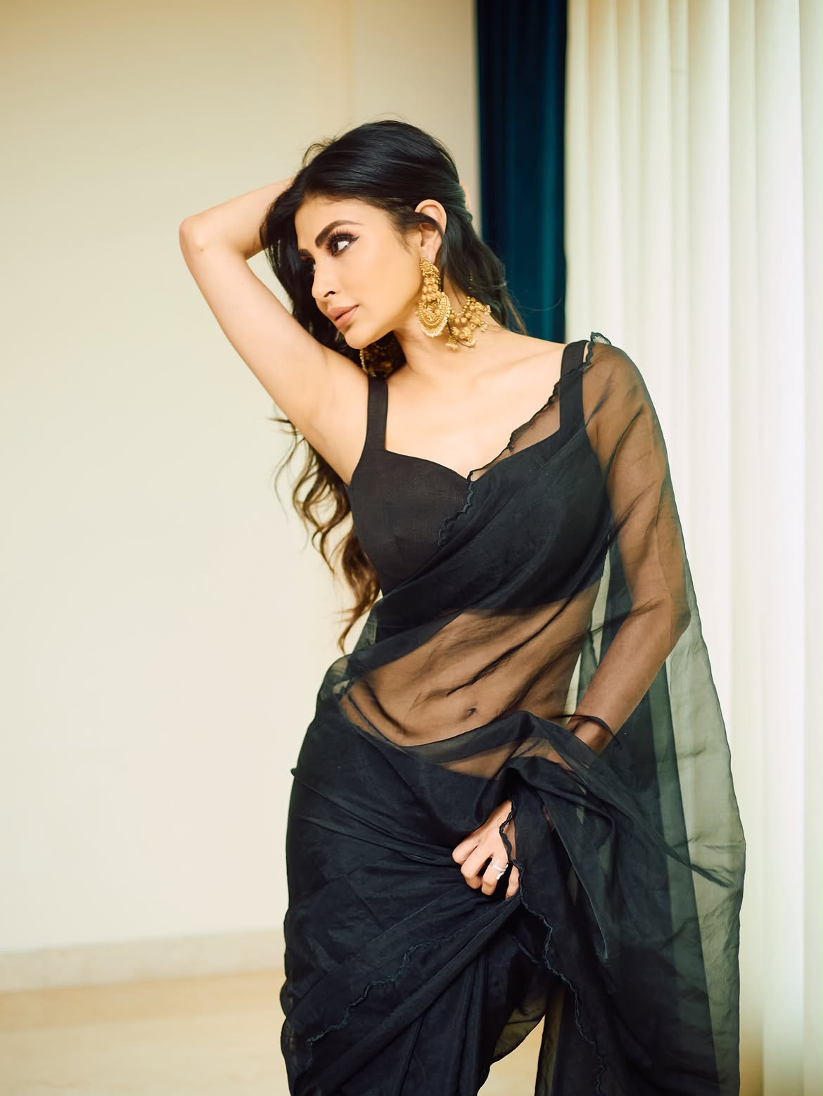 Mouni Roy Stuns in Timeless Black Sheer Saree Look