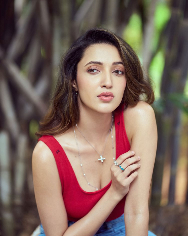 Neha Shetty Radiates Casual Charm in Red and Denim Look
