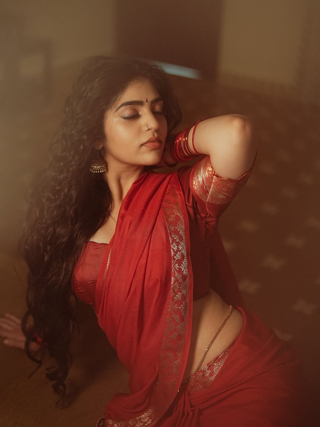 Bandhavi Sridhar Stuns in Elegant Red Saree With Old-School Charm
