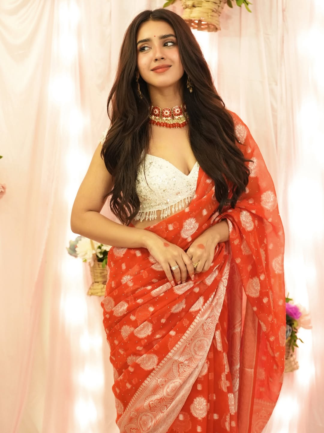 Roshni Walia Stuns in Elegant Red Saree With Festive Ganesha Vibes