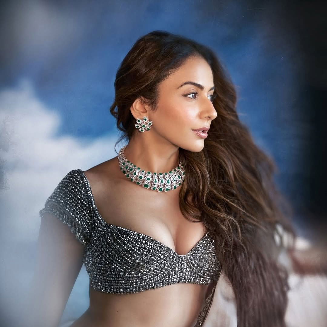 Rakul Preet Singh Dazzles in Silver Blouse and Elegant White Ensemble