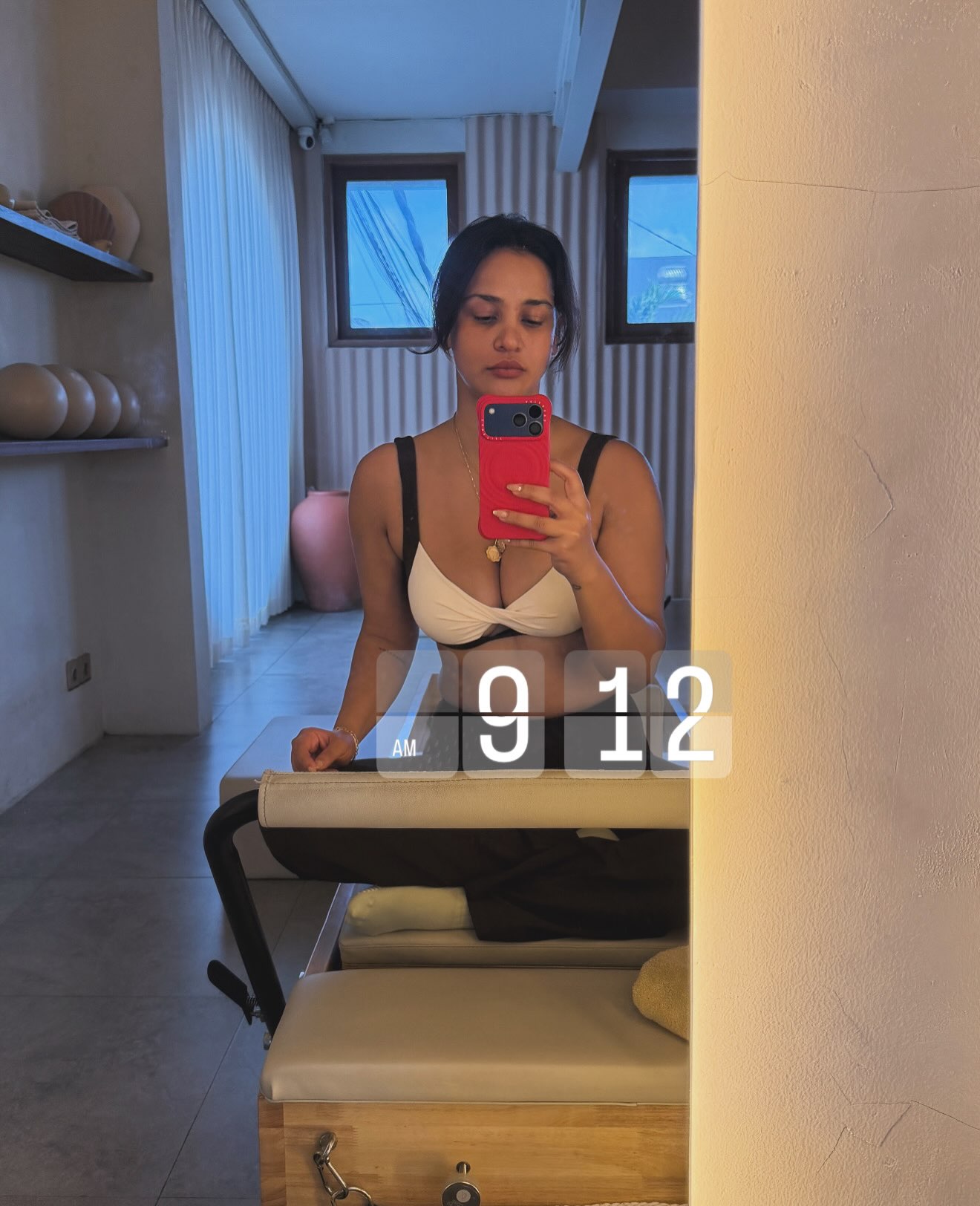 Aisha Sharma Turns Heads in Plunging Halter Dress