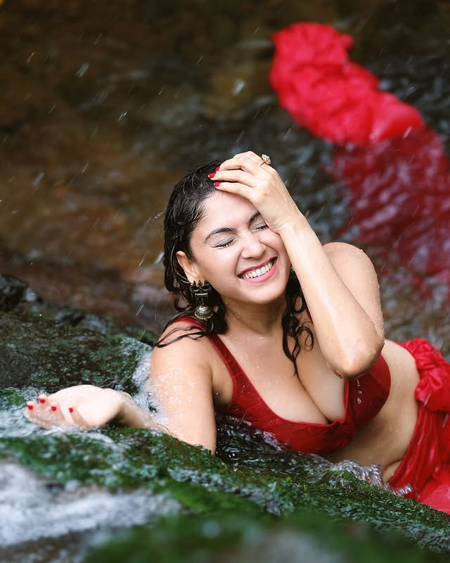 Manjari Fadnnis Stuns in a Striking Crimson Look by the Waterfall